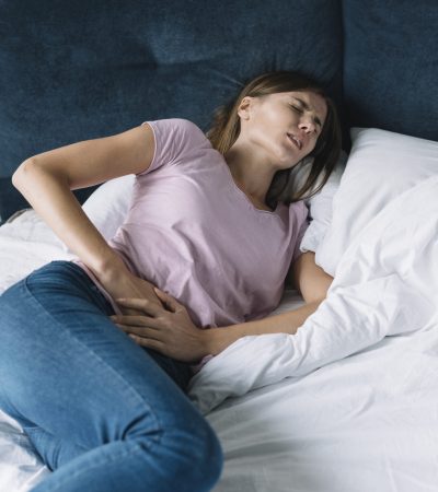 woman-suffering-from-diarrhoea-lying-bed