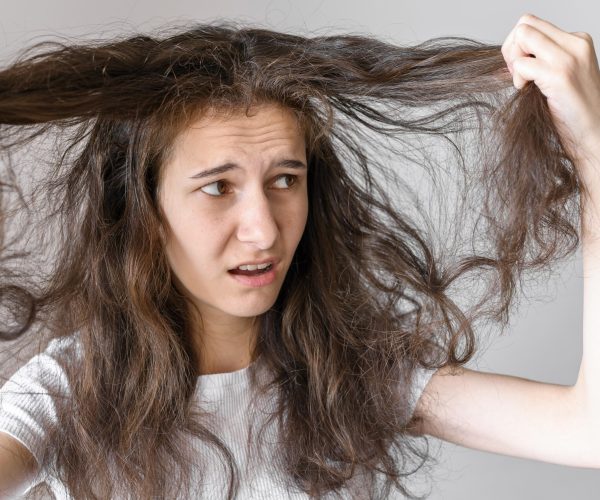 woman-worried-about-tangled-hair